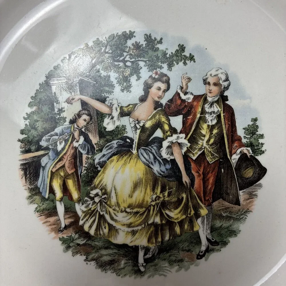 This Vogue Dinnerware Washington Colonial pattern plate with a courting couple